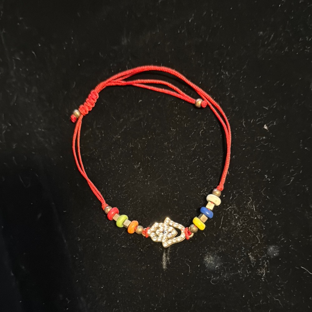 Red Beaded Bracelet with Silver Charm